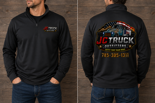 JC Truck Outfitters black Dri-Fit 1/4 zip - left chest logo on the front, full truck badge and 785-305-1311 across the back